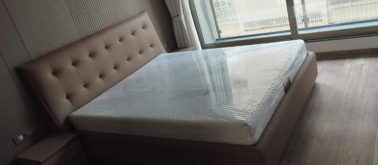 Custom bed frame built by Woodflex Designs, photographed in our Surat workshop