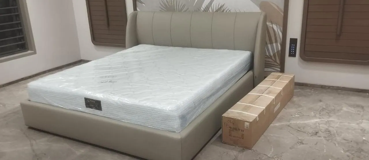 Custom bed frame built by Woodflex Designs, photographed in our Surat workshop