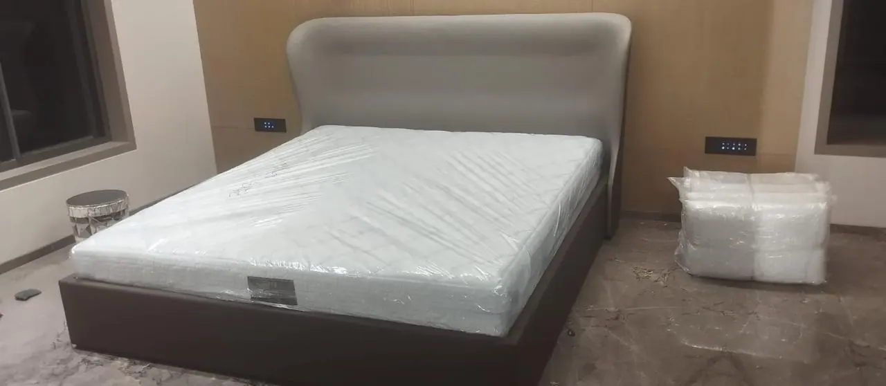 Custom bed frame built by Woodflex Designs, photographed in our Surat workshop