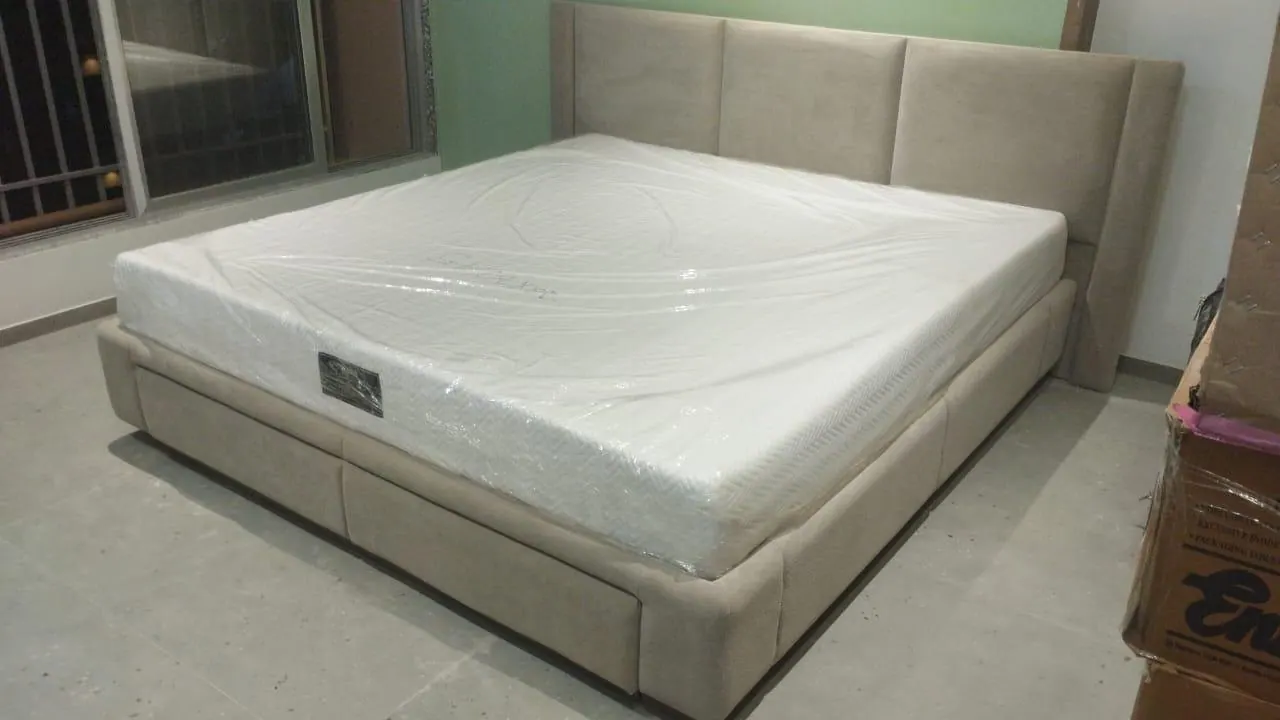 Custom bed frame made by Woodflex Designs, photographed in a client's home