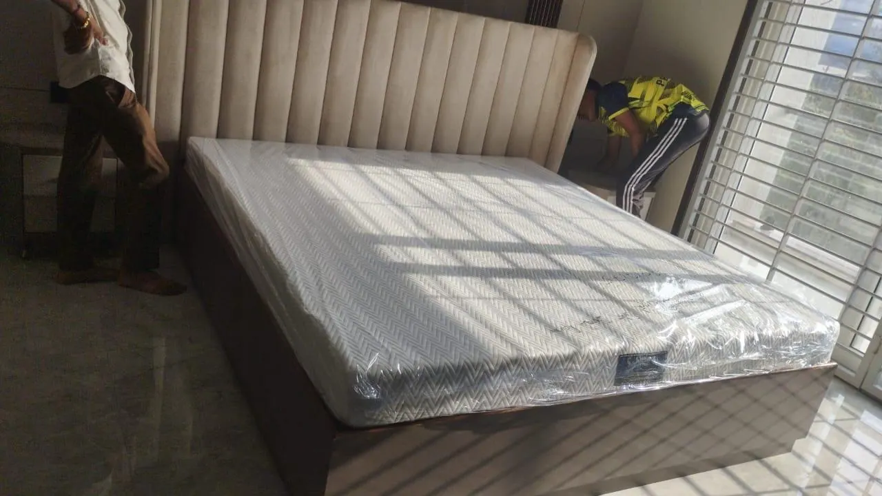 Custom bed frame built by Woodflex Designs, photographed in our Surat workshop