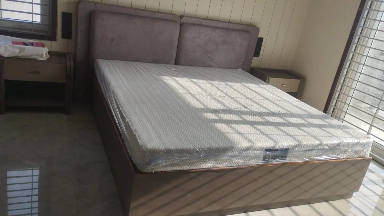 Custom bed frame built by Woodflex Designs, photographed in our Surat workshop
