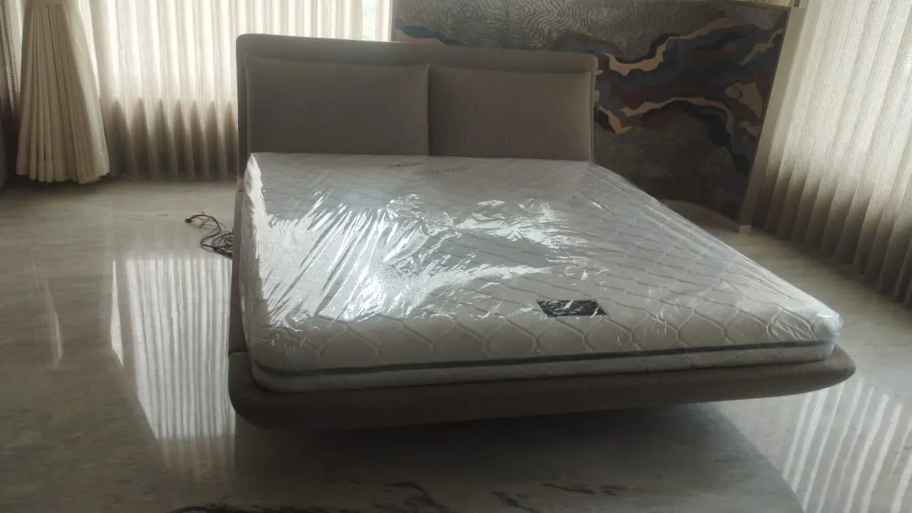 Custom bed frame made by Woodflex Designs, photographed in a client's home