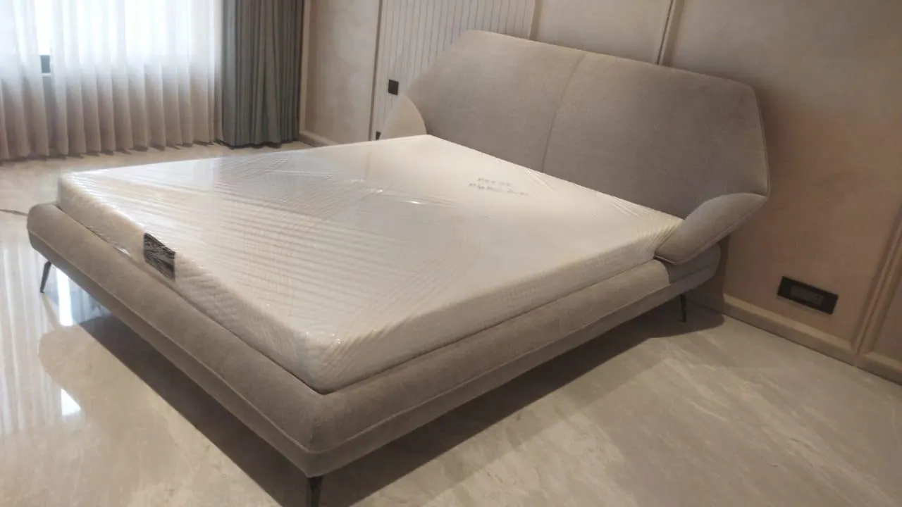 Custom bed frame built by Woodflex Designs, photographed in our Surat workshop