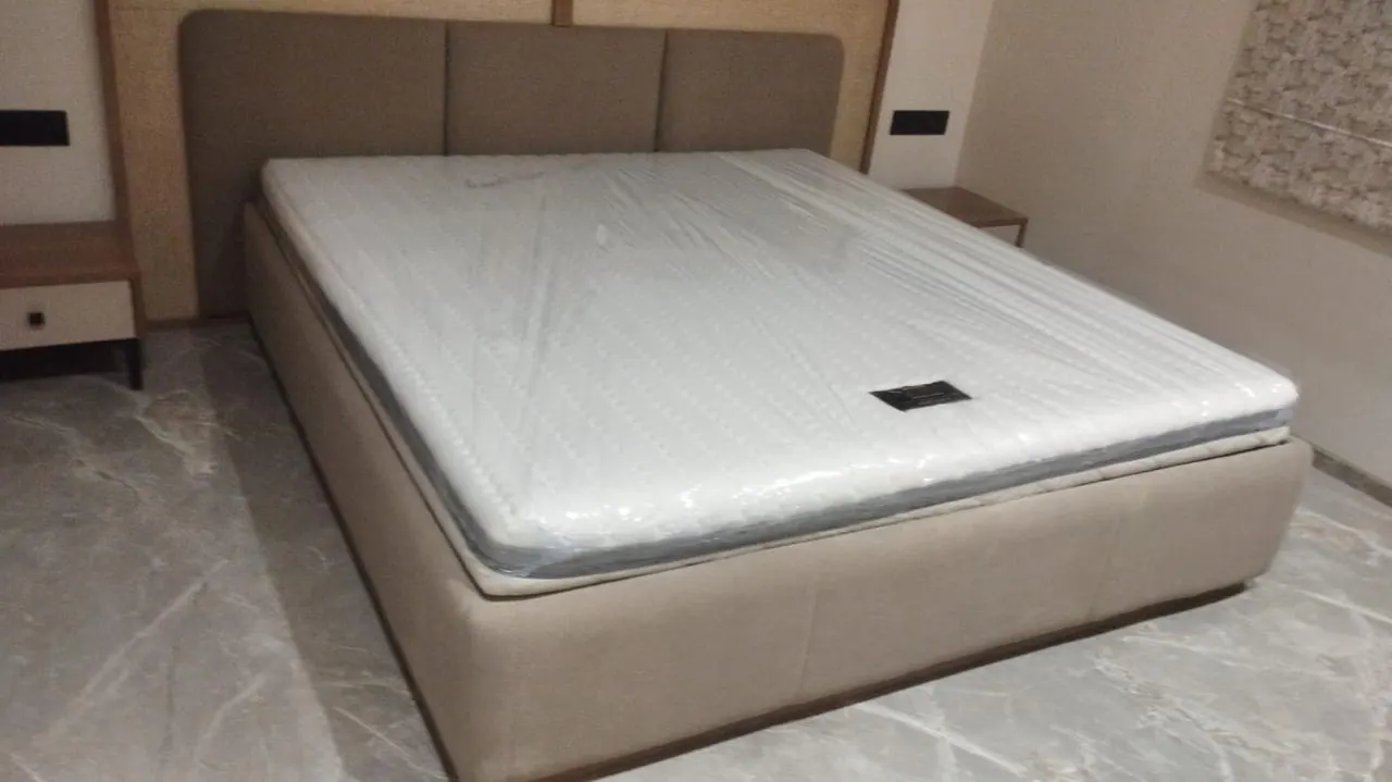 Custom bed frame made by Woodflex Designs, photographed in a client's home