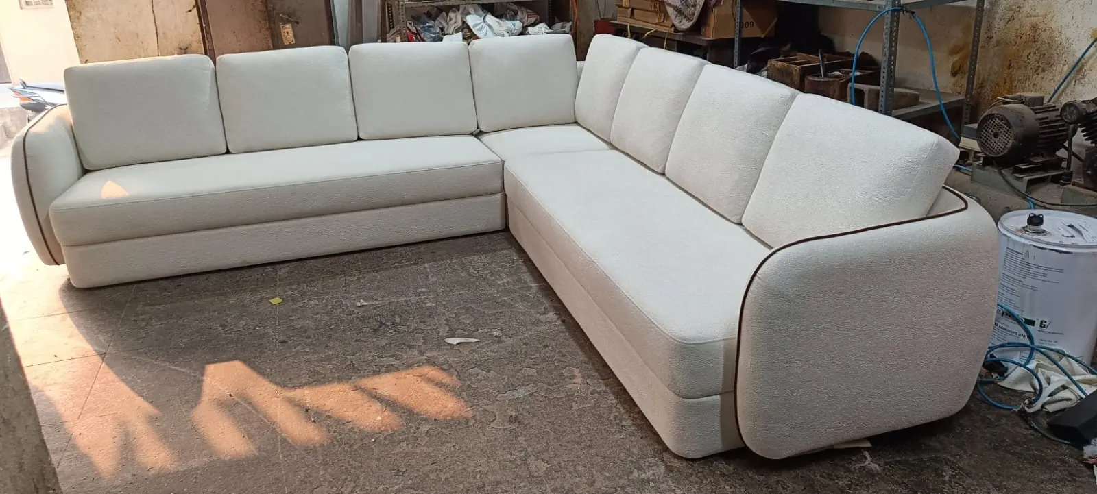 Custom sofa built by Woodflex Designs, photographed in our Surat workshop