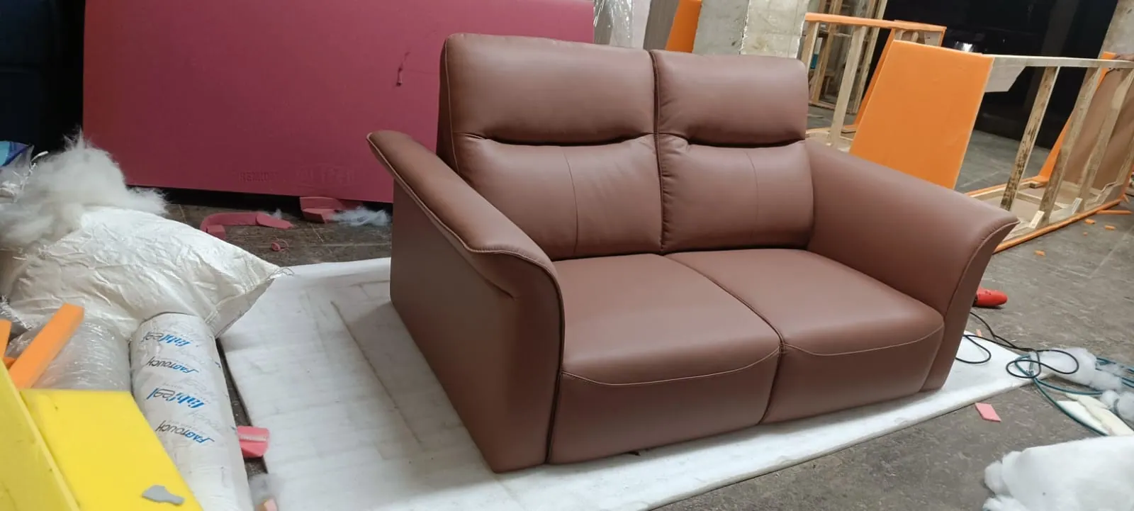 Custom sofa built by Woodflex Designs, photographed in our Surat workshop